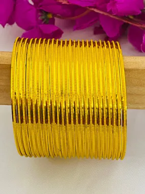 Appealing Yellow Color Plain Metal Bangles