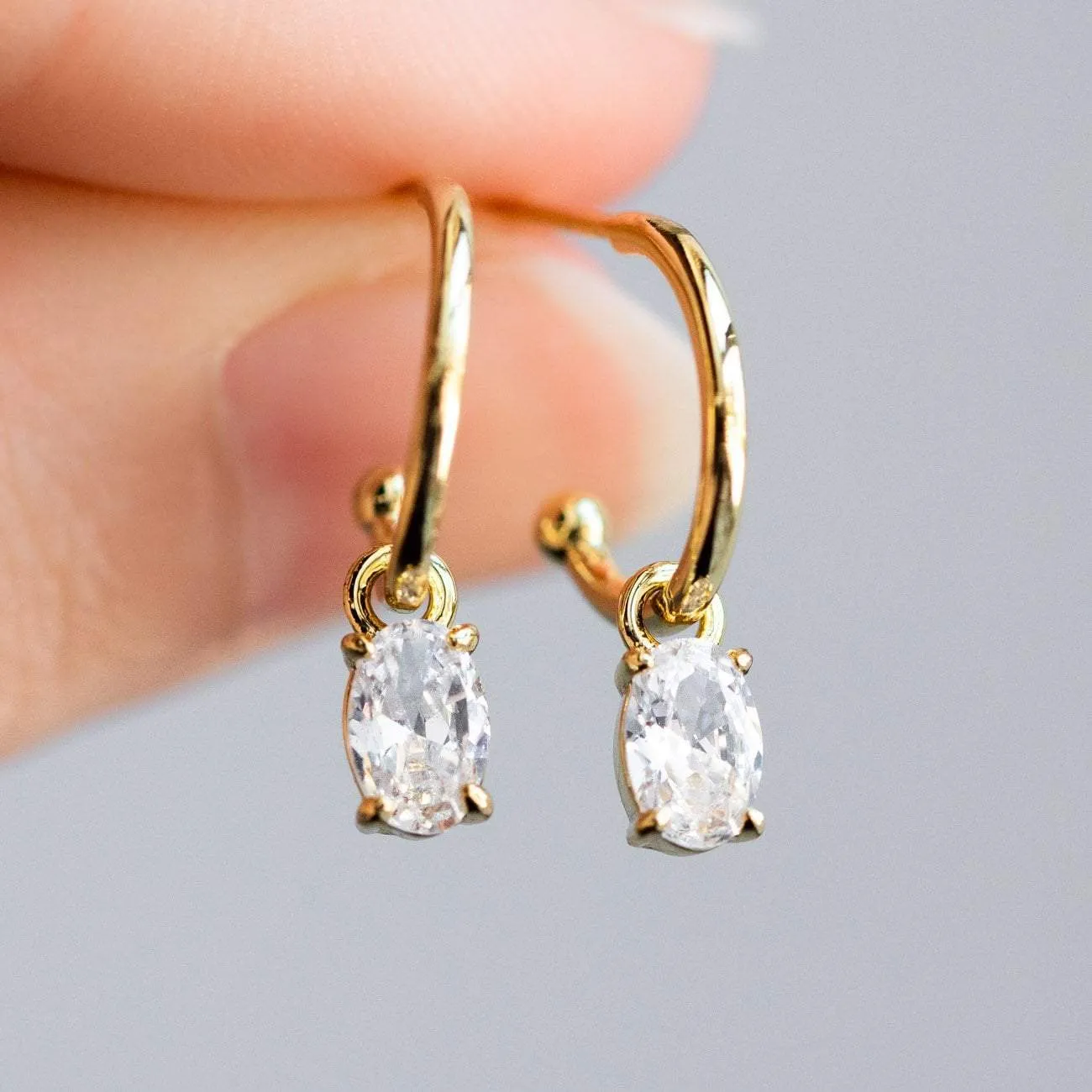 Gold CZ Emery Huggie Earrings